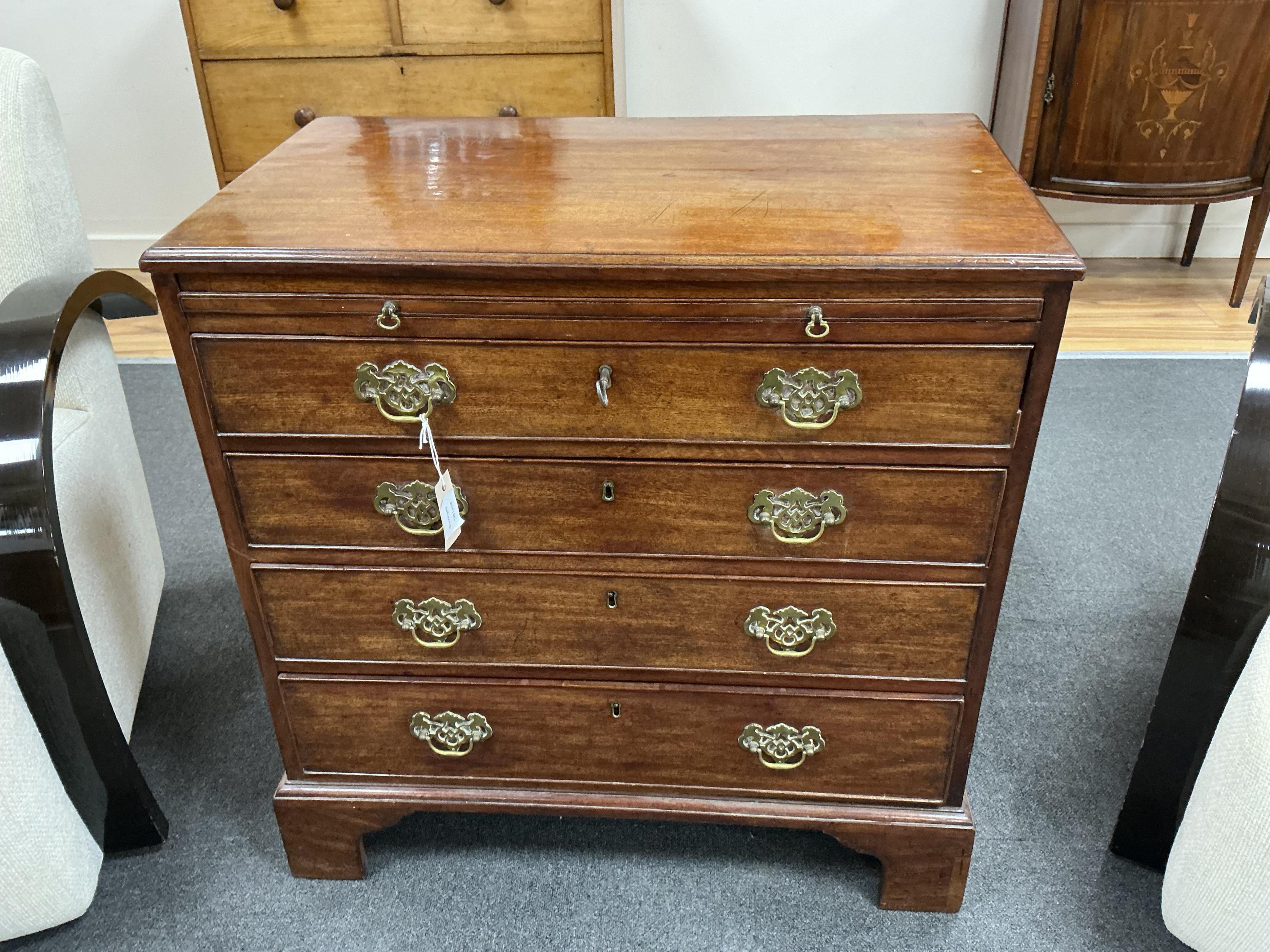 A small George III mahogany four drawer chest with brushing slide, width 78cm, depth 46cm, height 79cm